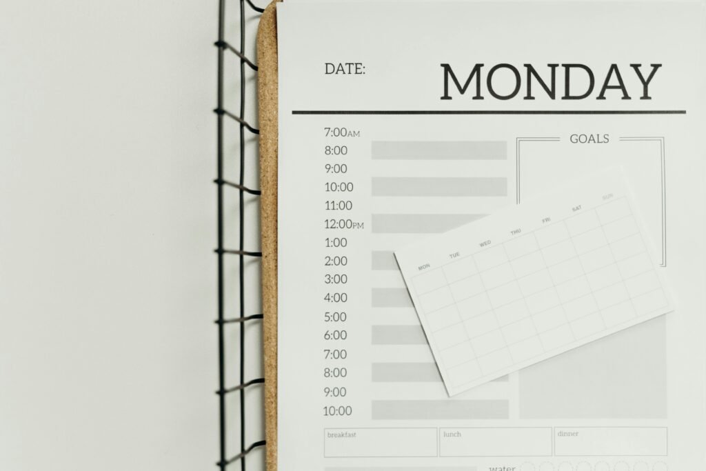 pexels-photo-7428866-7428866 Top view of a minimalist schedule planner with Monday header. Perfect for organizing daily tasks with goals section.